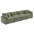Sofá modular de pana verde con cojines