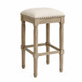 Taburete de bar con estructura de madera y asiento de lino beige